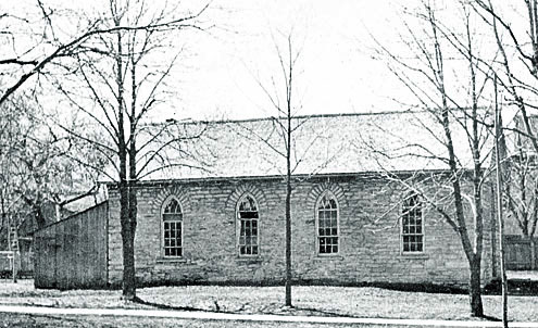 Stone schoolhouse at Queen and James Streets