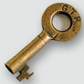 Brass key stamped with letters G.T.R.